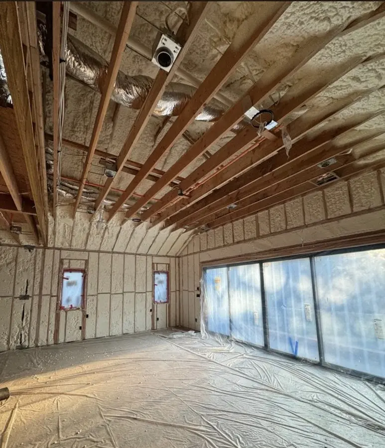 Interior walls and ceiling insulated with spray foam during new construction in Frankstown